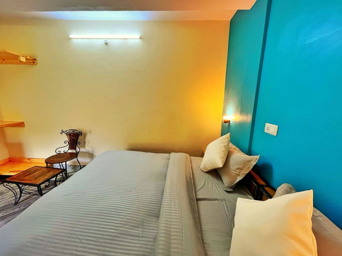 Orange Themed Room with Balcony